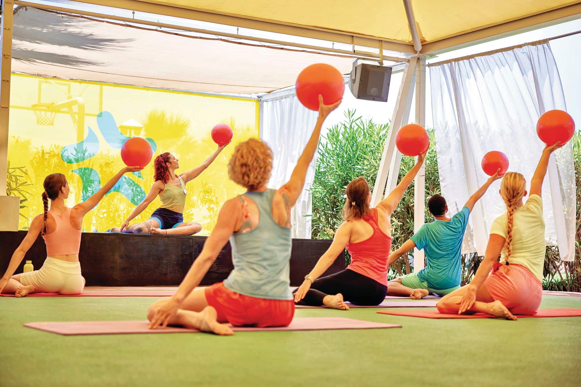 Guests taking part in a fitness class at the MAGIC LIFE Belek.