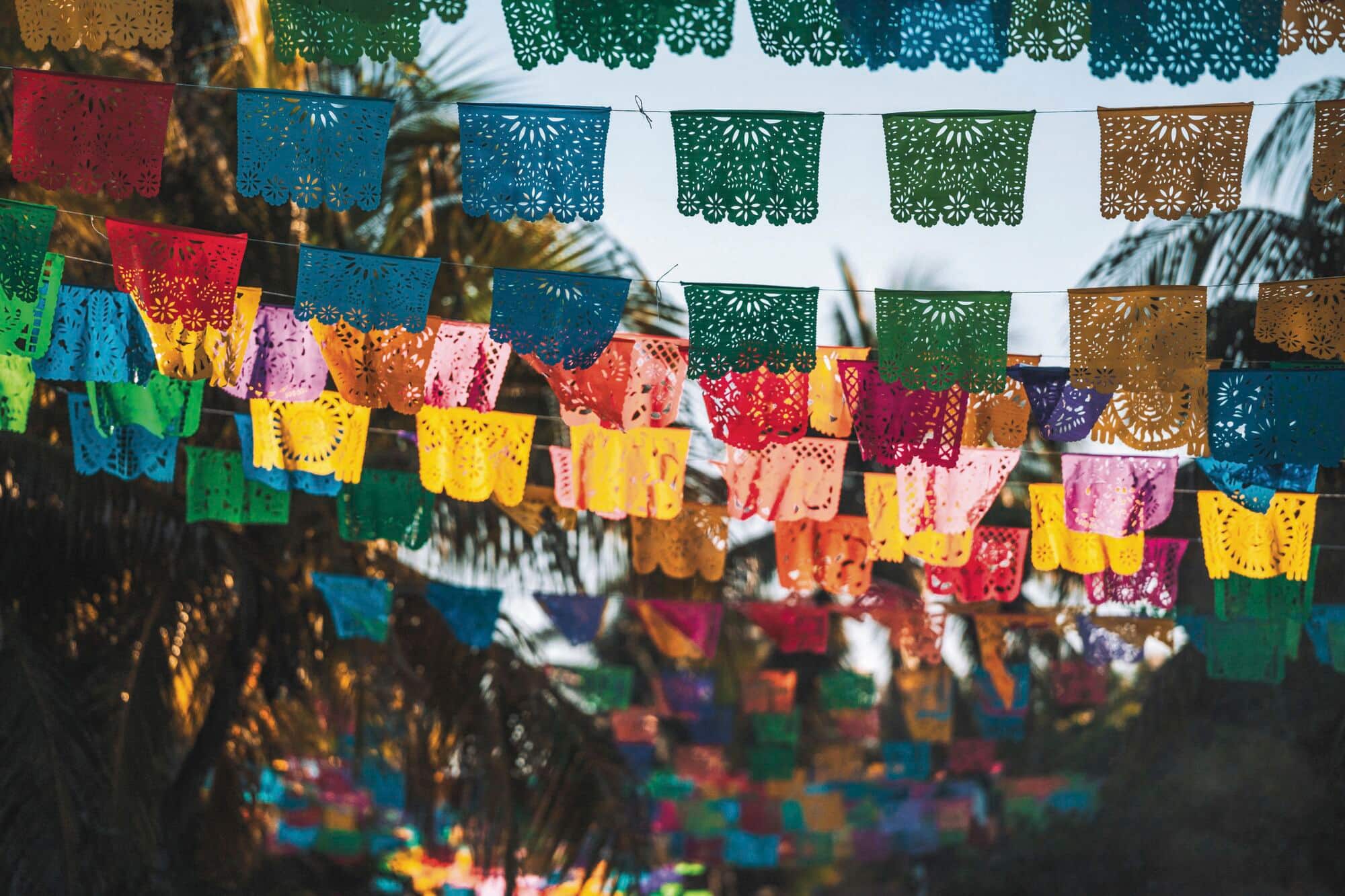 Papel picado banners flying in Tulum