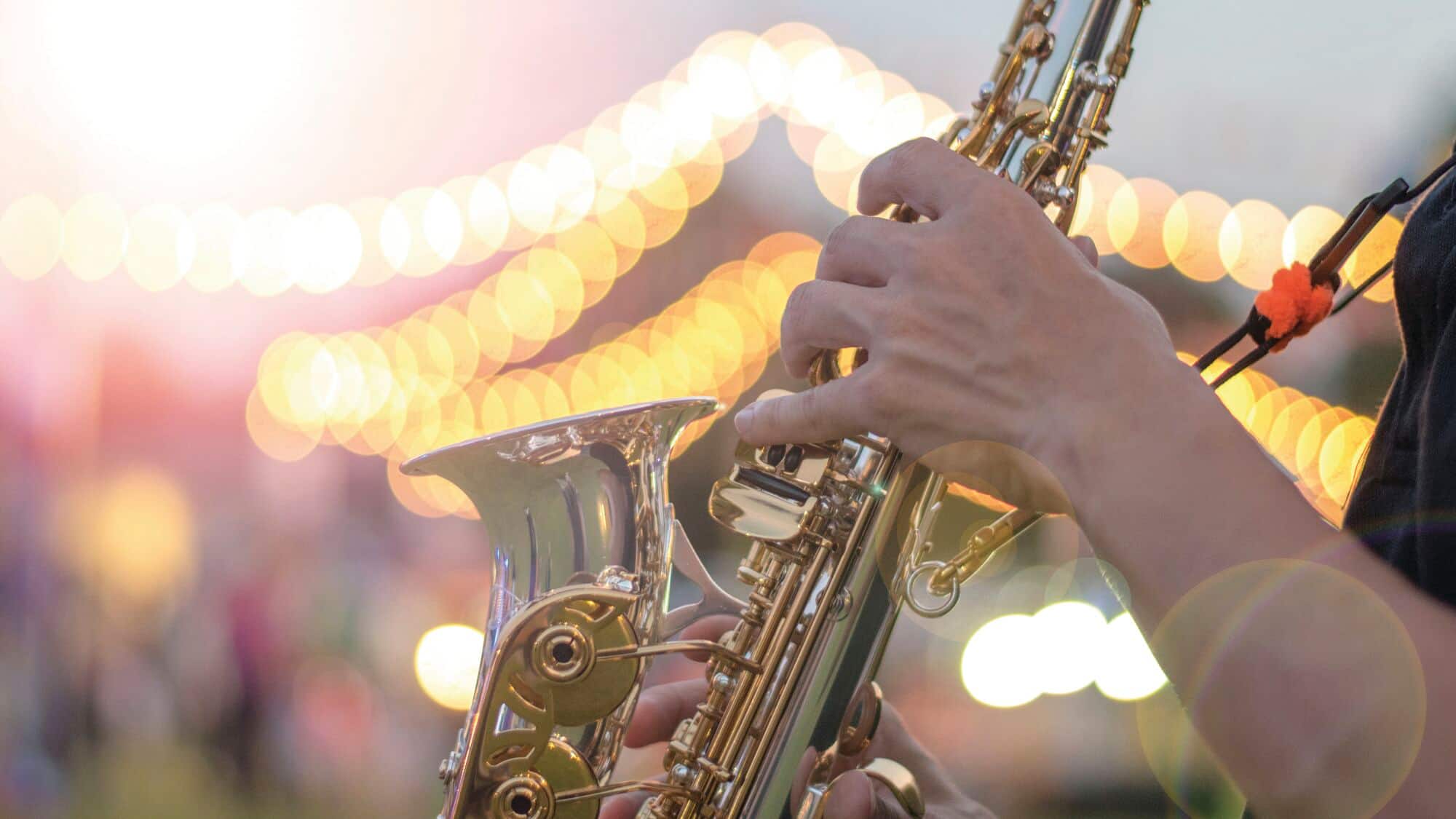 Person playing a saxophone