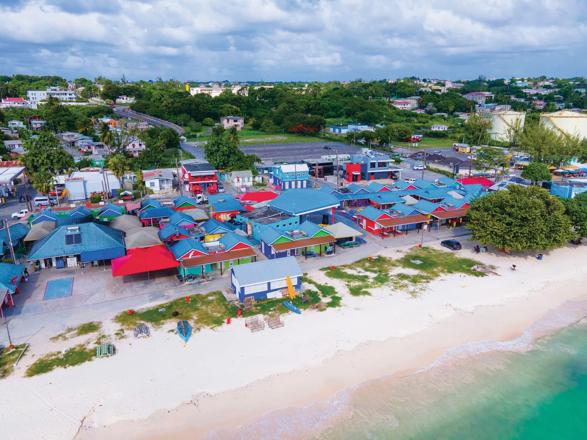 Aerial view of blue houses on Oistins beachfront in Barbados