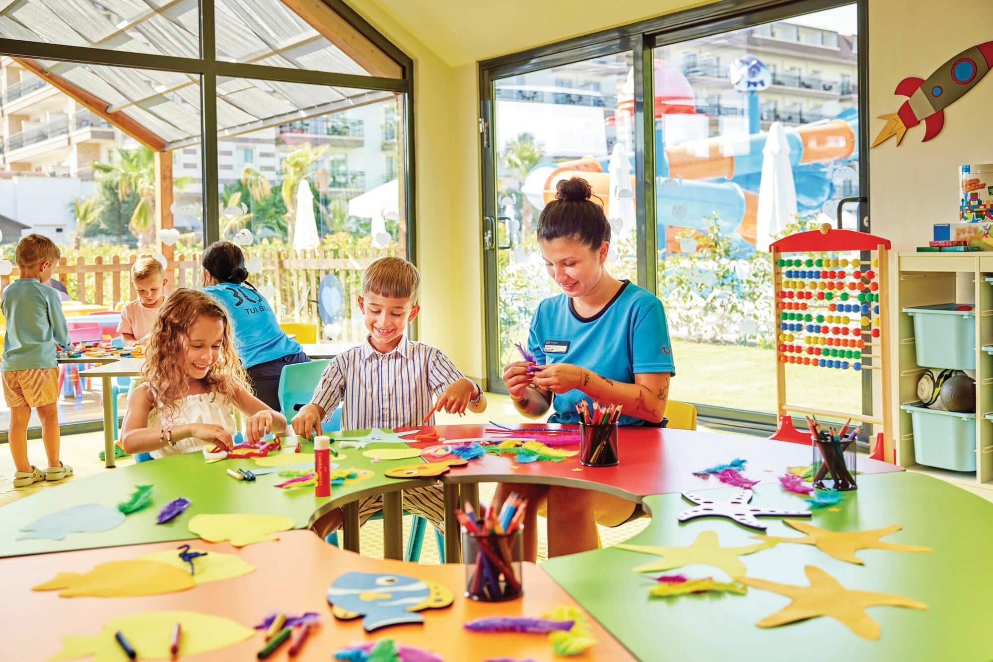 Children taking part in an arts and crafts session inside the kids’ club at TUI BLUE Marvis.