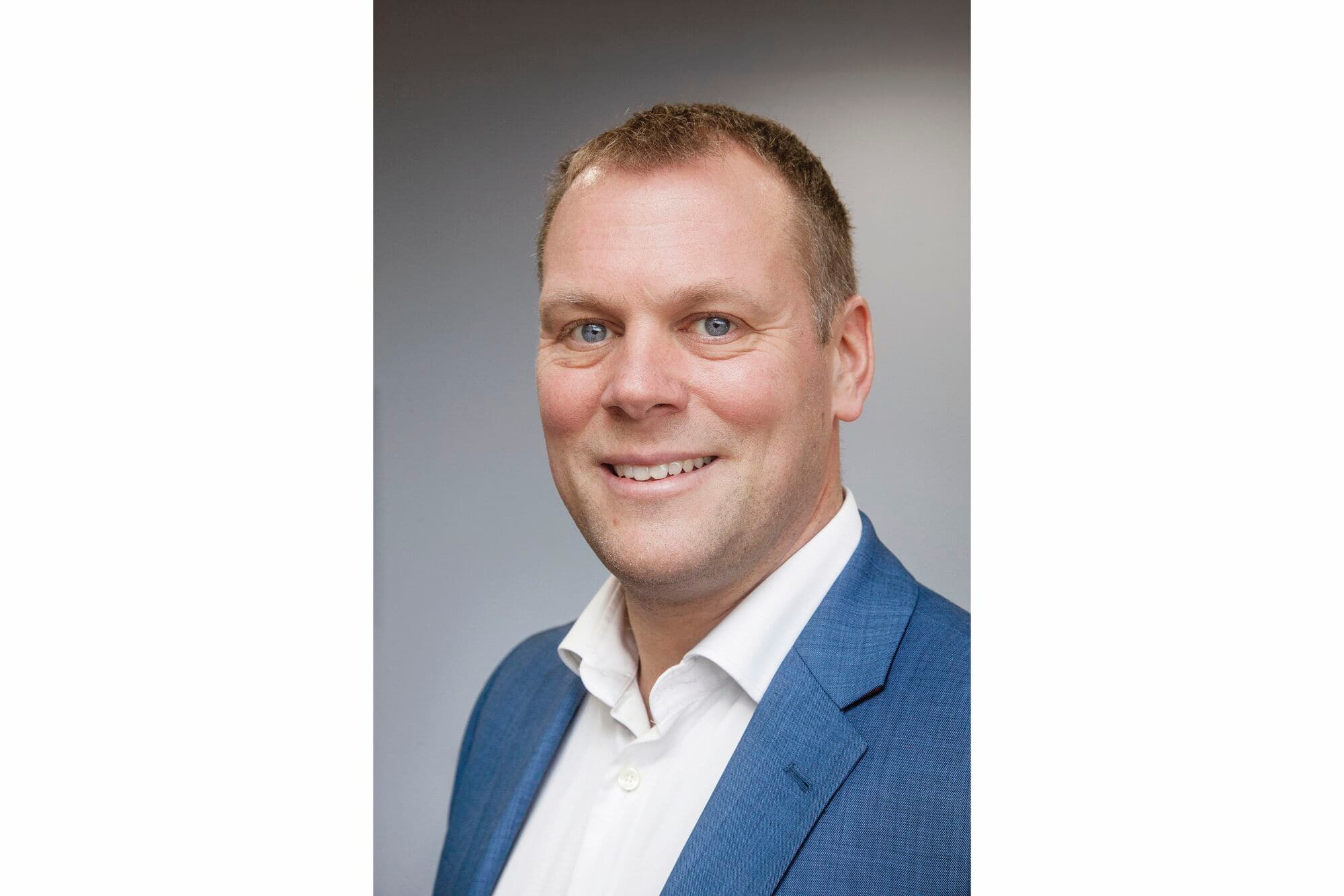 Headshot of Christopher Hackney, CEO Marella.