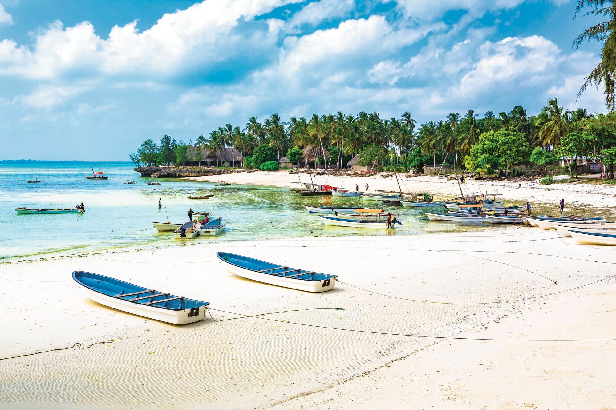Small fishing boats on a beach in Kiwengwa.
