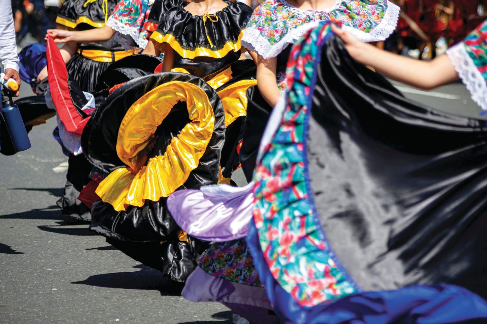 Colourful traditional folkloric dresses with wide, flared skirts
