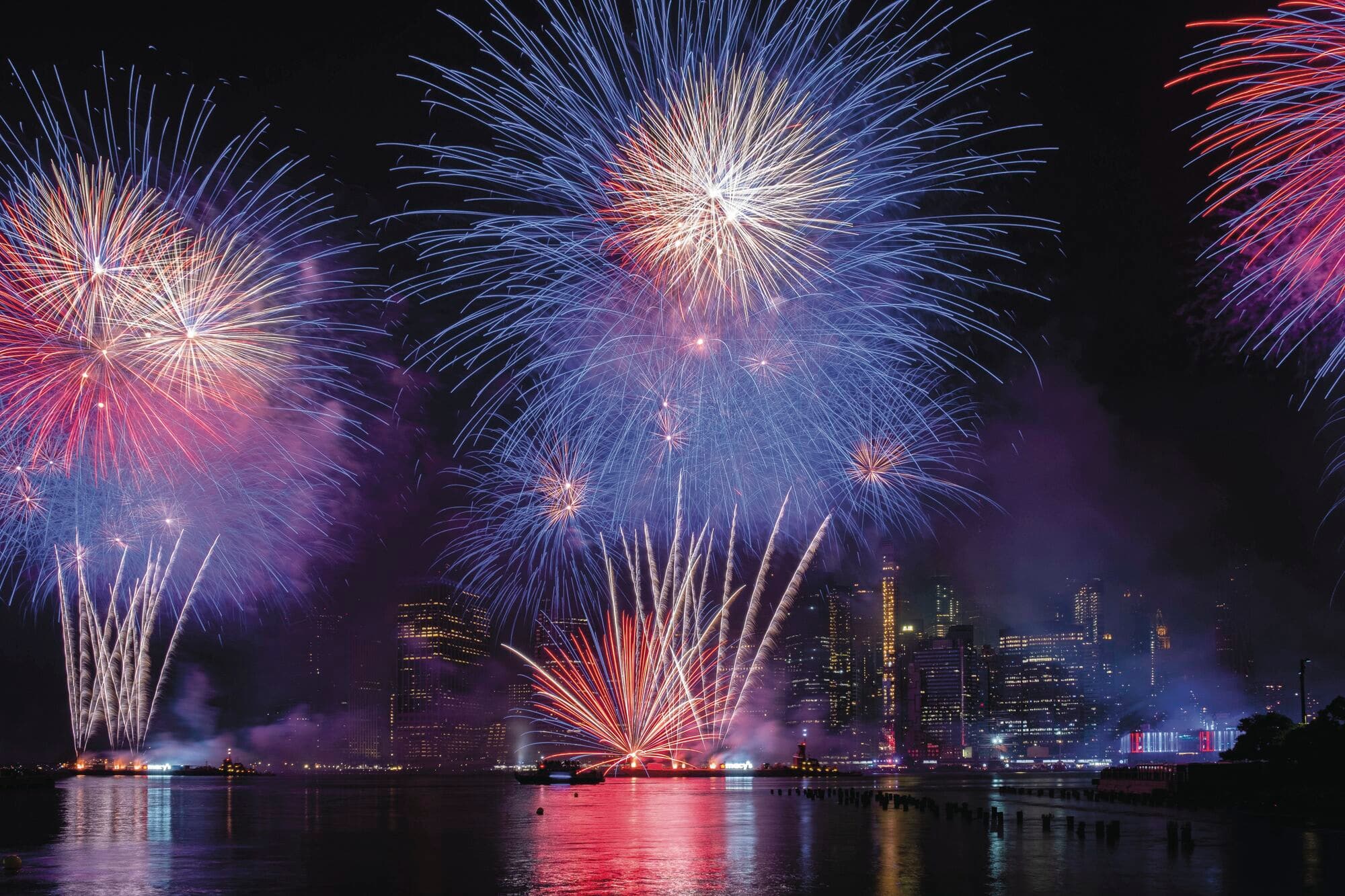A view of the fireworks display, taking place on the banks of the Hudson