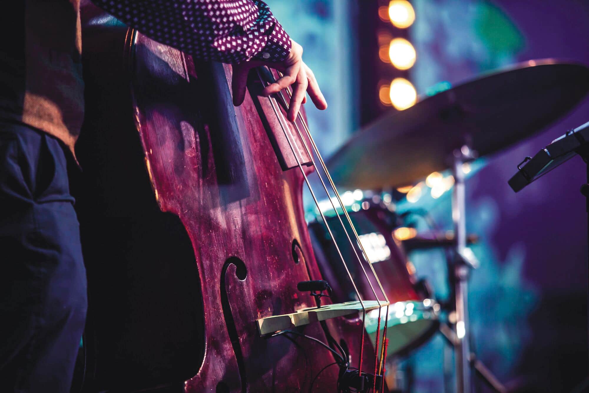 A close up of a jazz musician's double bass at a live performance